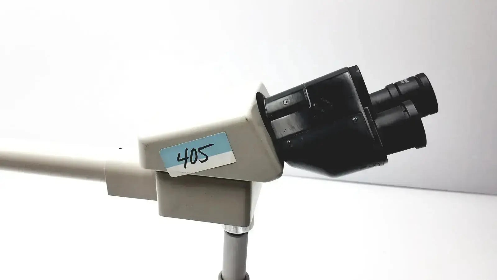 Nikon 030039 gray and black binocular microscope with labeled tag 405 ideal for buy used medical equipment sale