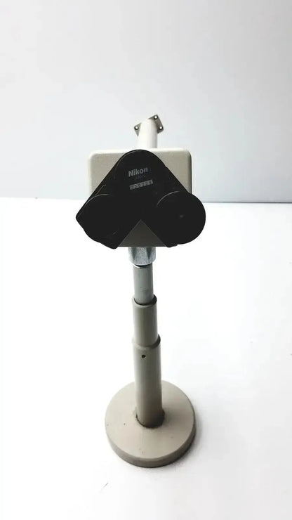 Black Nikon 030039 binocular microscope with gray adjustable stand ideal for buy used medical equipment purposes
