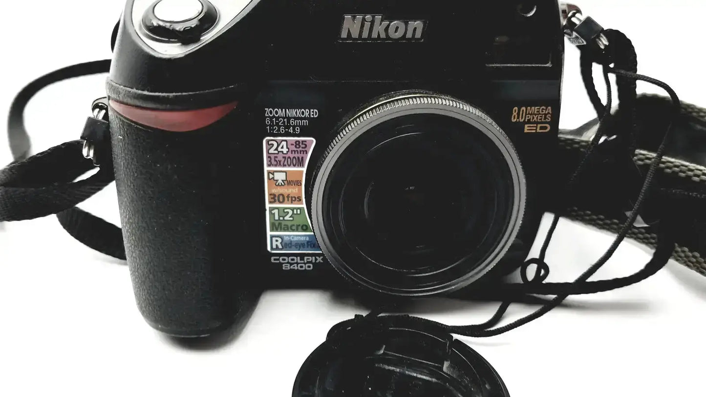 Black nikon coolpix 9400 digital camera with textured grip silver lens ring 24.8mp 3x optical zoom for reliable monitoring