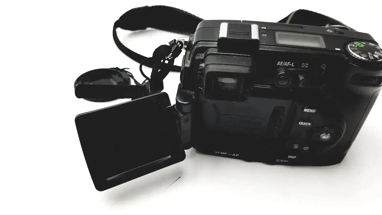Black nikon coolpix e8400 digital camera with flip-out pressure display monitor and attached strap for reliable monitoring
