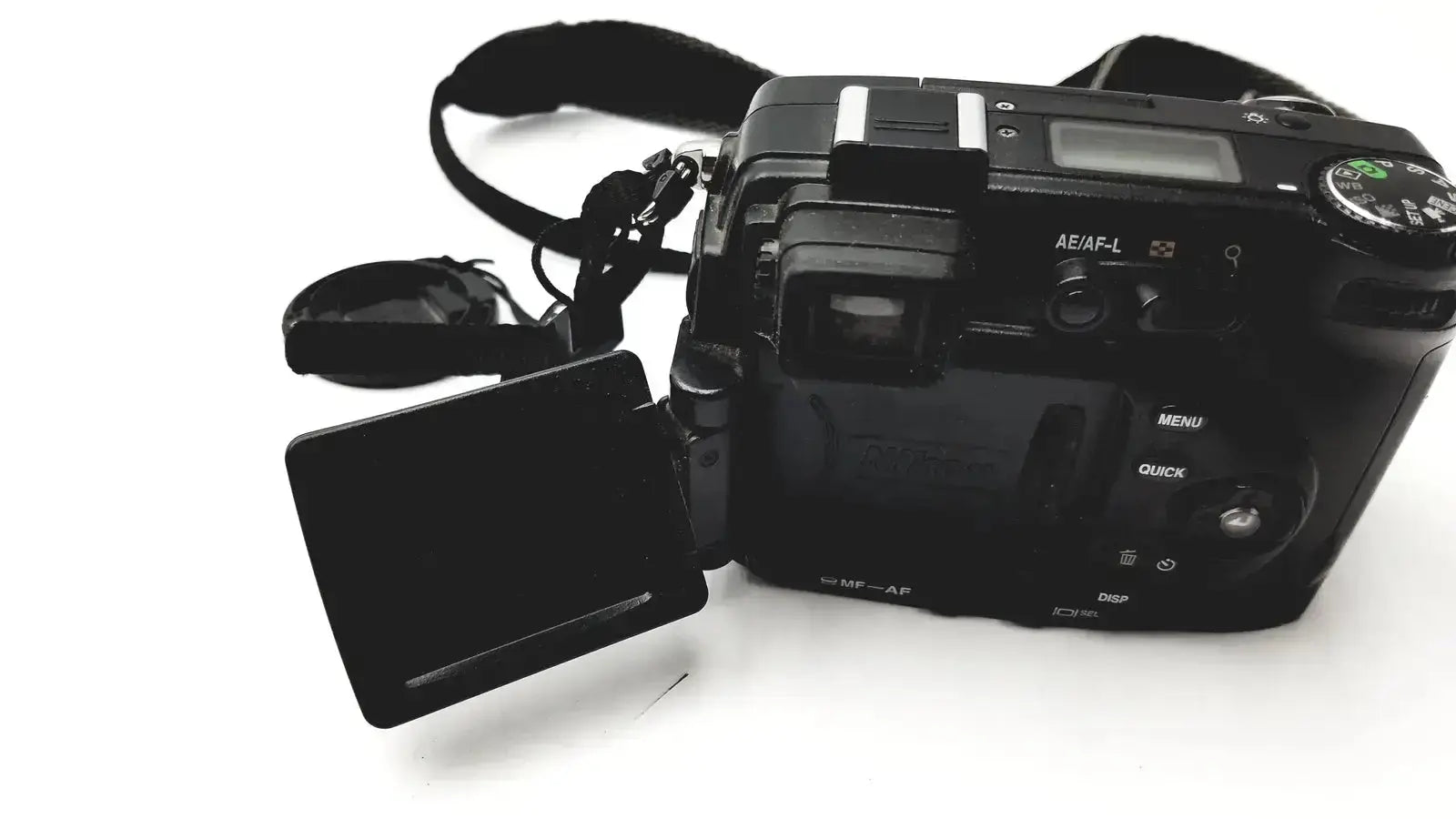 Black nikon coolpix e8400 digital camera with flip-out pressure display monitor and attached strap for reliable monitoring