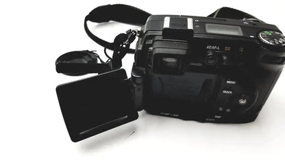 Black nikon coolpix e8400 digital camera with flip-out pressure display monitor and attached strap for reliable monitoring
