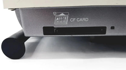 Backside of nikon digital sight microscope camera controller showing gray cf card slot with black plastic insert and white text