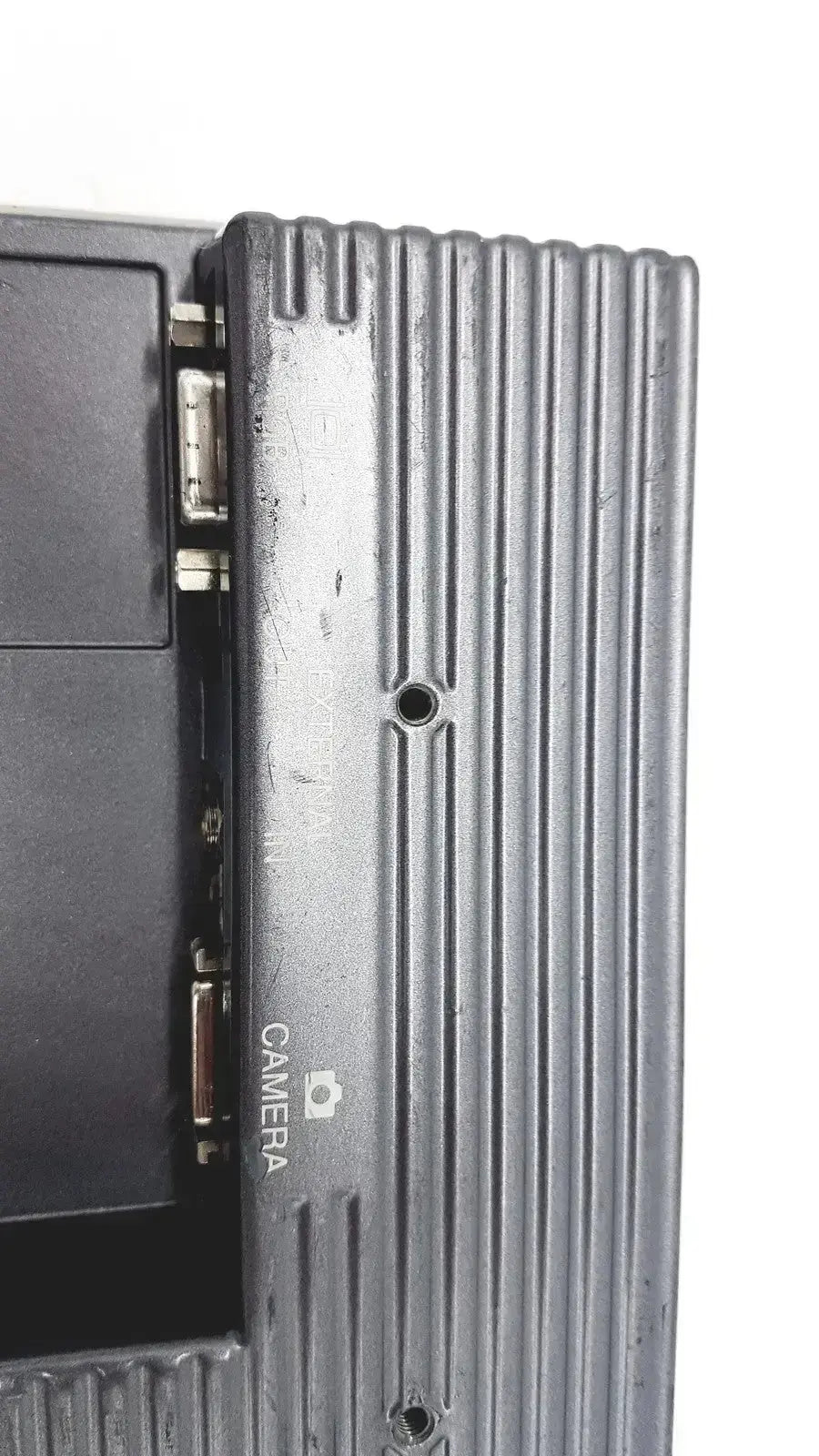 Black ribbed side panel of nikon digital sight microscope camera controller with camera label and icon visible