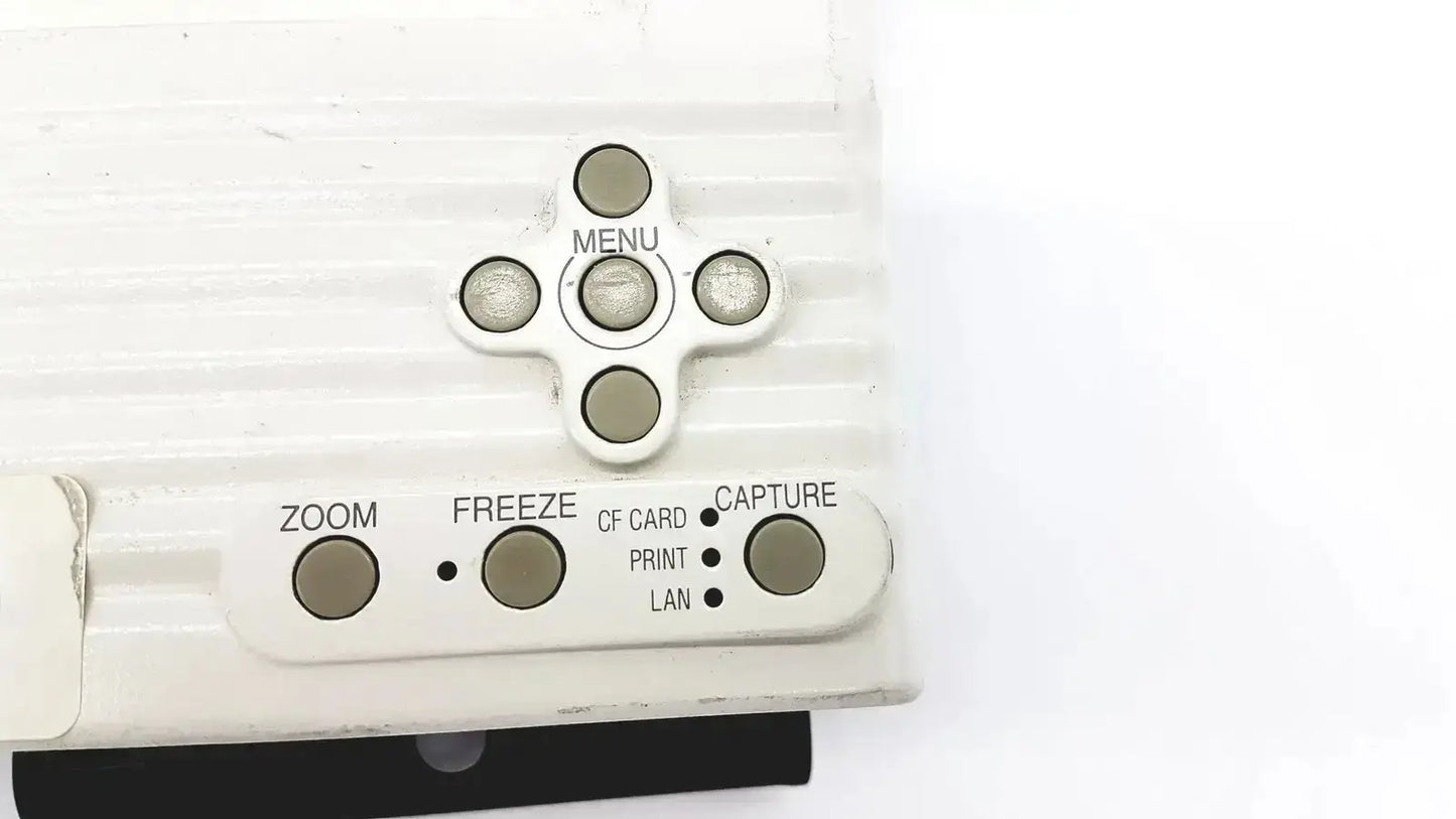 White plastic nikon digital sight microscope camera controller with directional pad and function buttons on back side