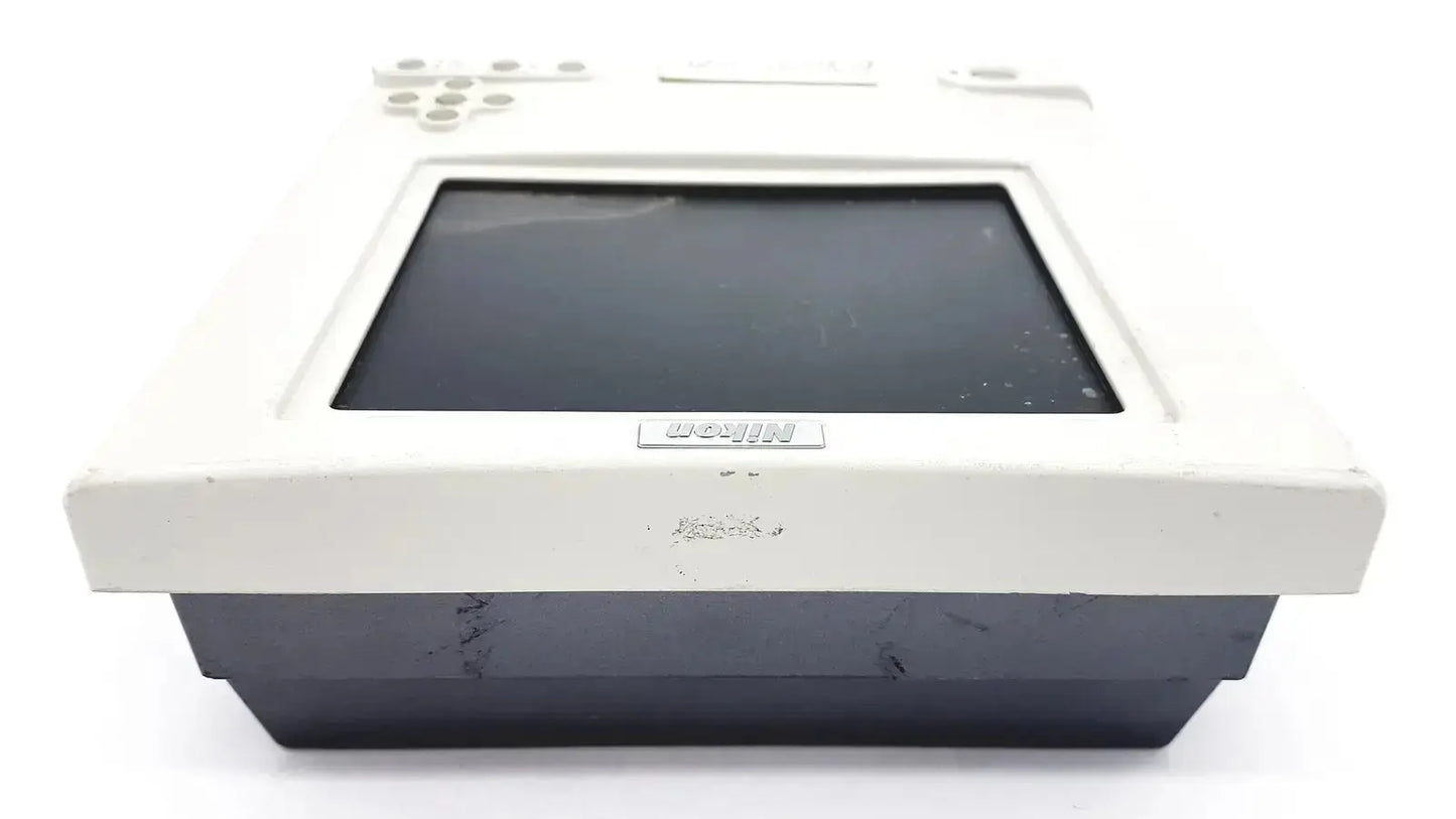White and black nikon digital sight microscope camera controller showing the back with rectangular screen and keypad
