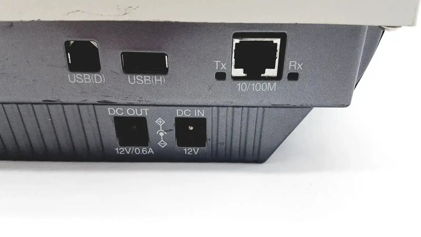 Rear panel of black nikon digital sight microscope camera controller with usb, ethernet tx rx ports, and dc power connectors