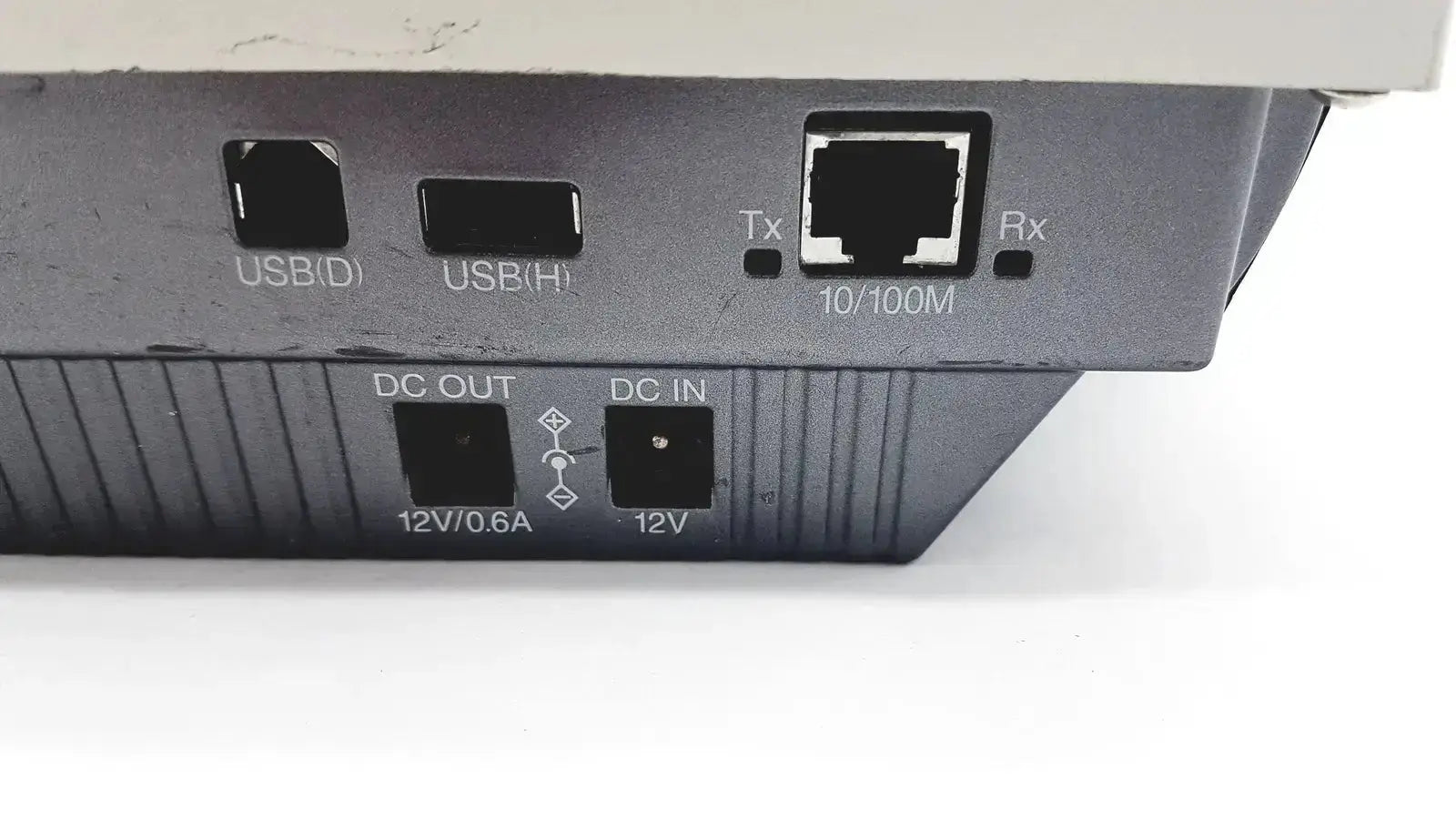 Rear panel of black nikon digital sight microscope camera controller with usb, ethernet tx rx ports, and dc power connectors