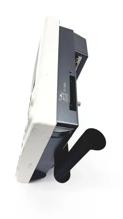 Black and white nikon digital sight microscope camera controller showing back side with a tf card slot on its side