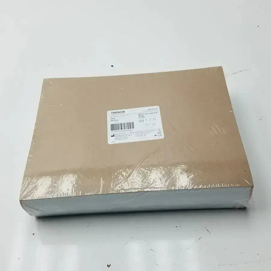 Brown cardboard box wrapped in clear plastic with nissha medical technologies recording charts label and barcode