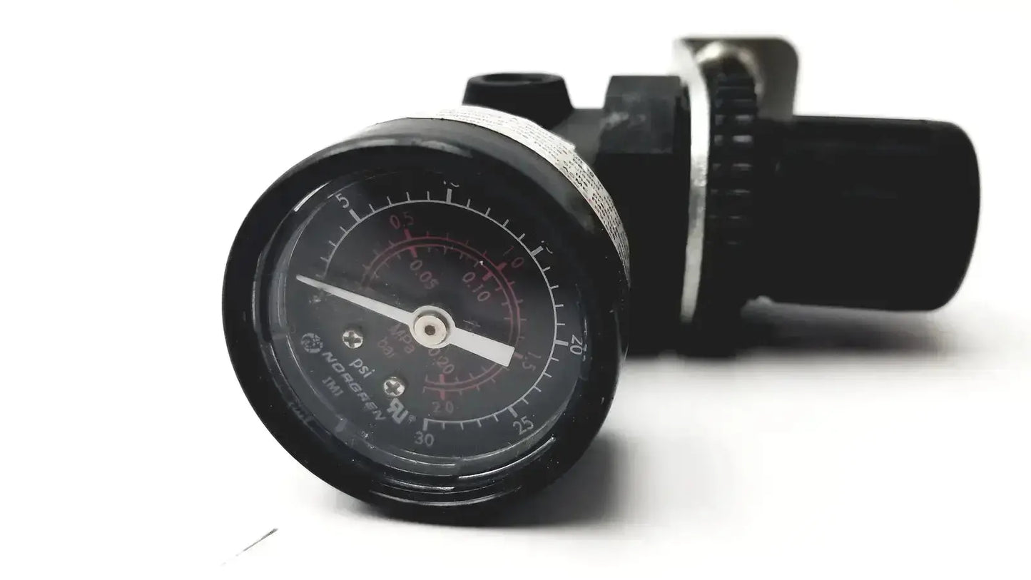 Black vdo pressure gauge with circular dial in psi and bar on norgren r07-100-rgka mini pressure regulator