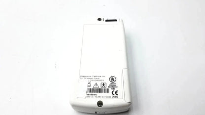 White plastic Novametrix 513 pulse oximeter monitor with printed labels and certification marks on the back side