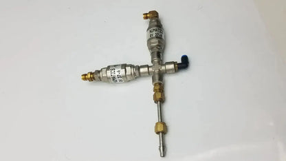Silver and brass industrial fluid valve assembly of numatics rv 37-a 37-a relief valve with labeled components g-bbde3-22s