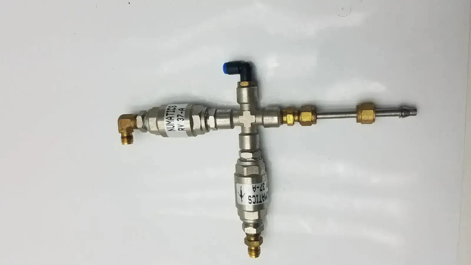 Silver and brass numatics rv 37-a relief valve with threaded connections and blue cap model g-bbde3-22s