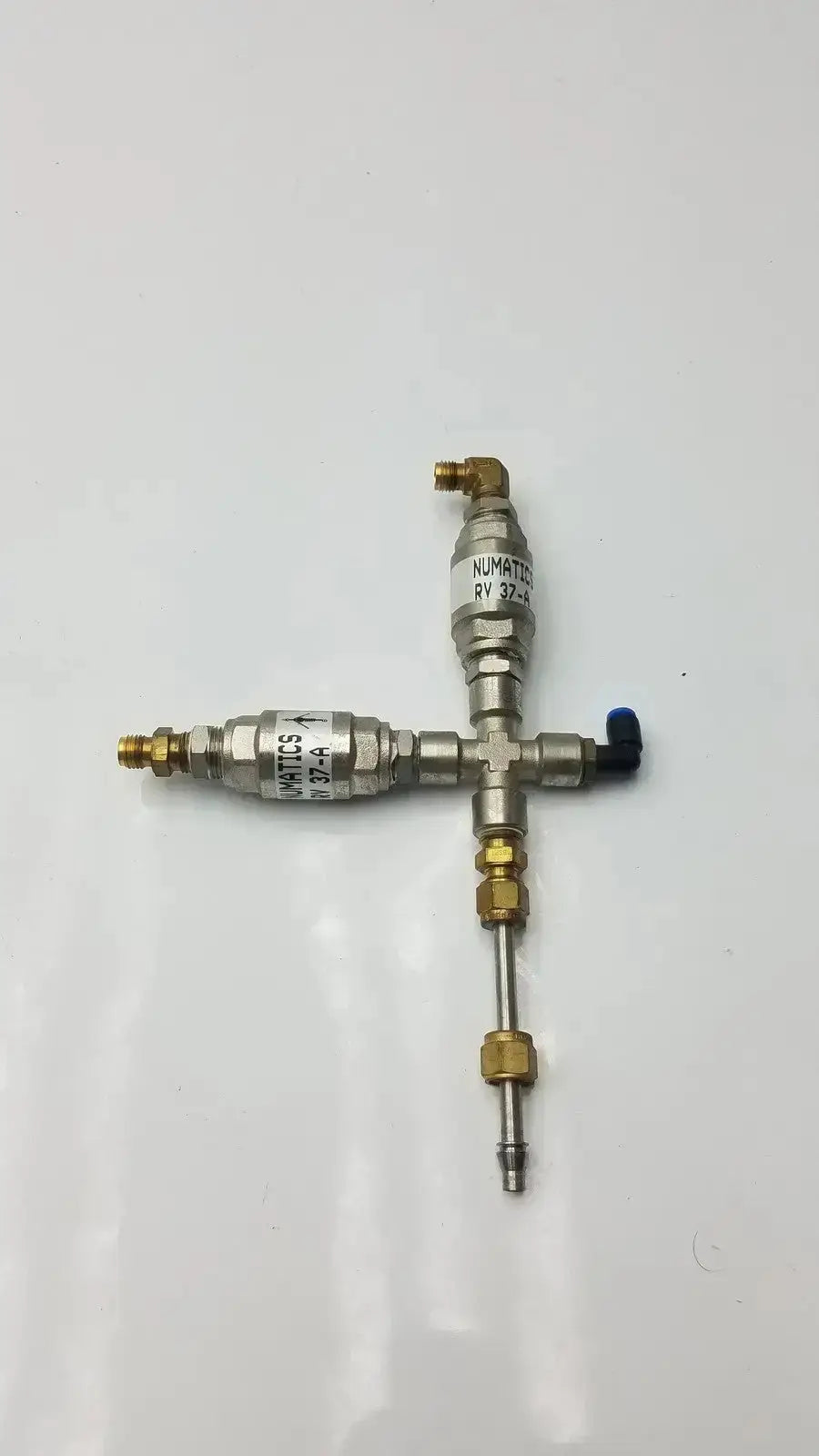 Silver and brass-colored numatics rv 37-a relief valve industrial assembly with labeled components model g-bbde3-22s