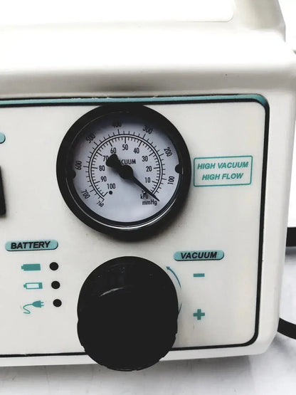 White high vacuum ohio medical care-e-vac 3 portable aspirator suction pump with black gauge and control knob