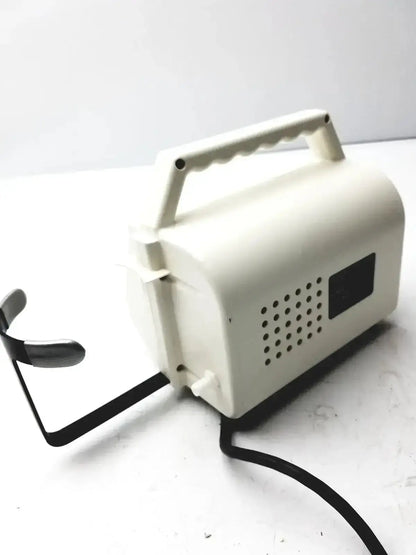 Off-white plastic ohio medical care-e-vac 3 portable aspirator suction pump with molded handle and black perforated grille