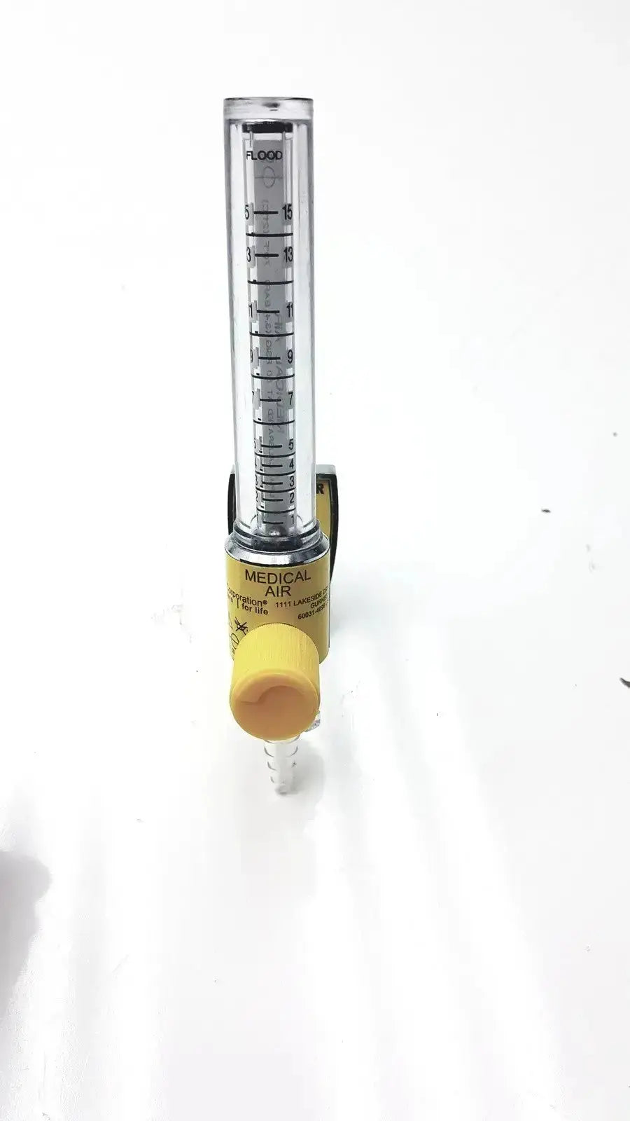 Clear glass medical compressor inlet air flow meter with yellow plastic cap and label for Ohio Medical Compressor 50 Psig