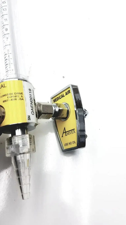 Yellow and black amvex medical air regulator with clear graduated flow meter for ohio medical compressor inlet 50 psig
