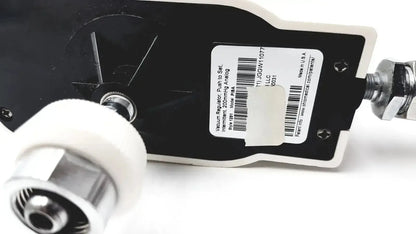 Black ohio medical vacuum regulator push-to-set with white label and silver metallic fittings for medical use