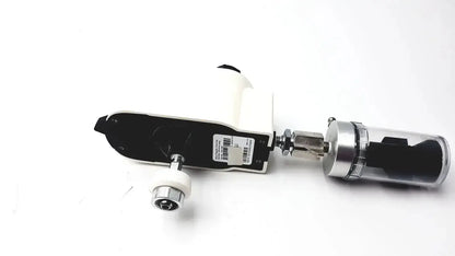 White and black industrial-grade ohio medical vacuum regulator with metallic silver cylindrical attachment for medical use