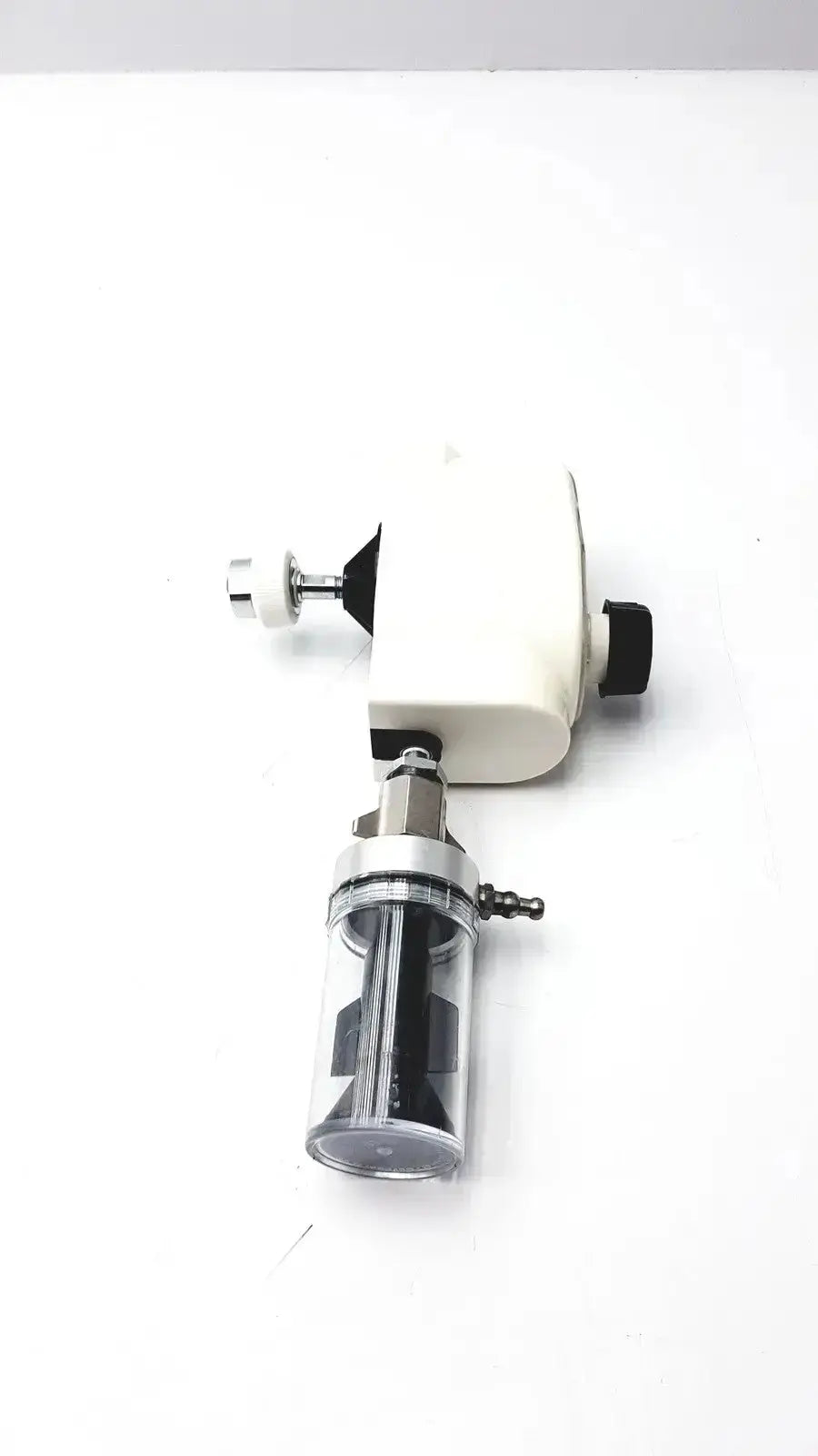 White and black ohio medical vacuum regulator with transparent cylindrical filter housing for medical vacuum regulator use