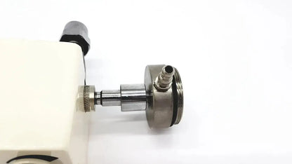 Ohmeda ffa19643 intermittent unit showing a metallic cylindrical valve with threaded connections and knurled knob