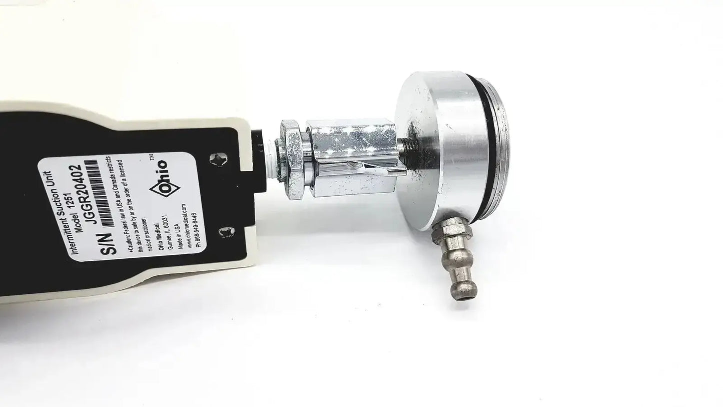 Silver metallic ohmeda ohio medical pressure sensor with black white labeled housing for medical intermittant suctiion
