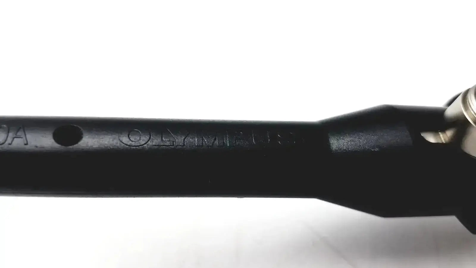 Black plastic olympic brand handle with metallic connector of olympus a22003a rigid 4mm x 70º degree scope