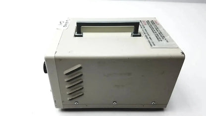 Beige rectangular Olympus CLK-4 halogen light source with black handle and vent slits for efficient halogen light use