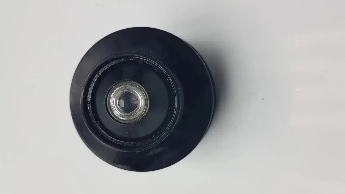 Black circular olympus microscope condenser aplanat achromat 1.4 lens with metallic silver center for precise microscopy