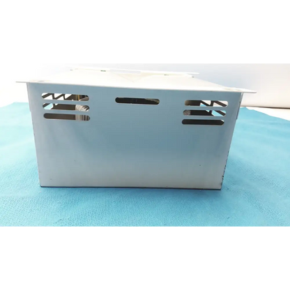 Silver metallic rectangular power supply unit with ventilation slots on the sides.
