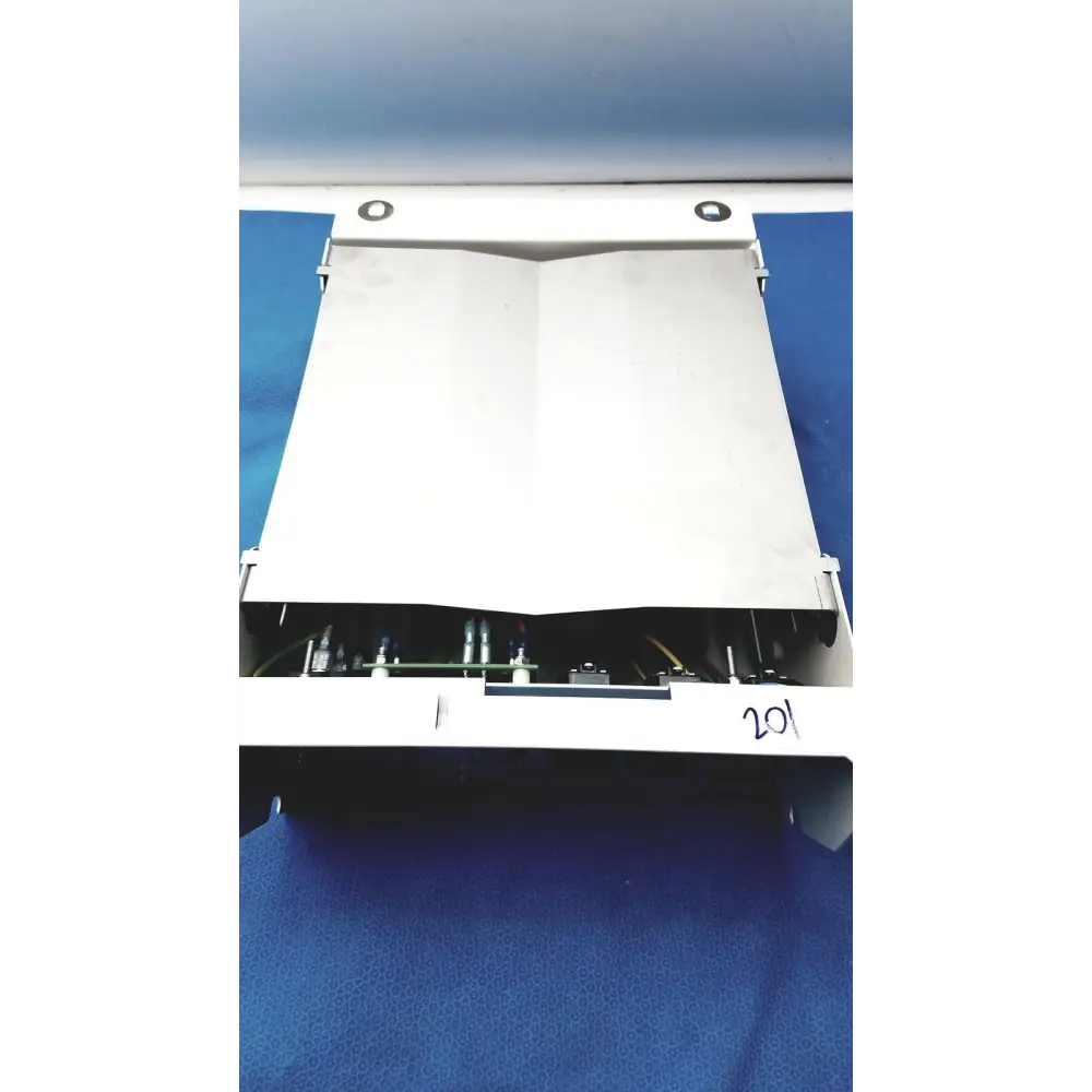 White industrial-grade electronic enclosure with visible internal circuitry and wiring.