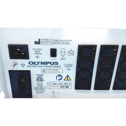 White olympus separation transformer with black power input and output sockets, labeled as maj-1647 set b.