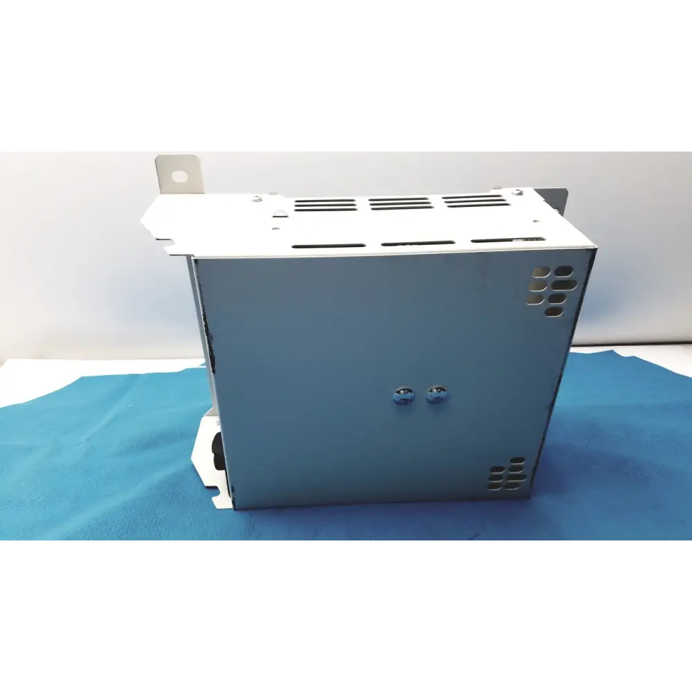 Gray metal industrial power supply unit with ventilation slots and mounting brackets.