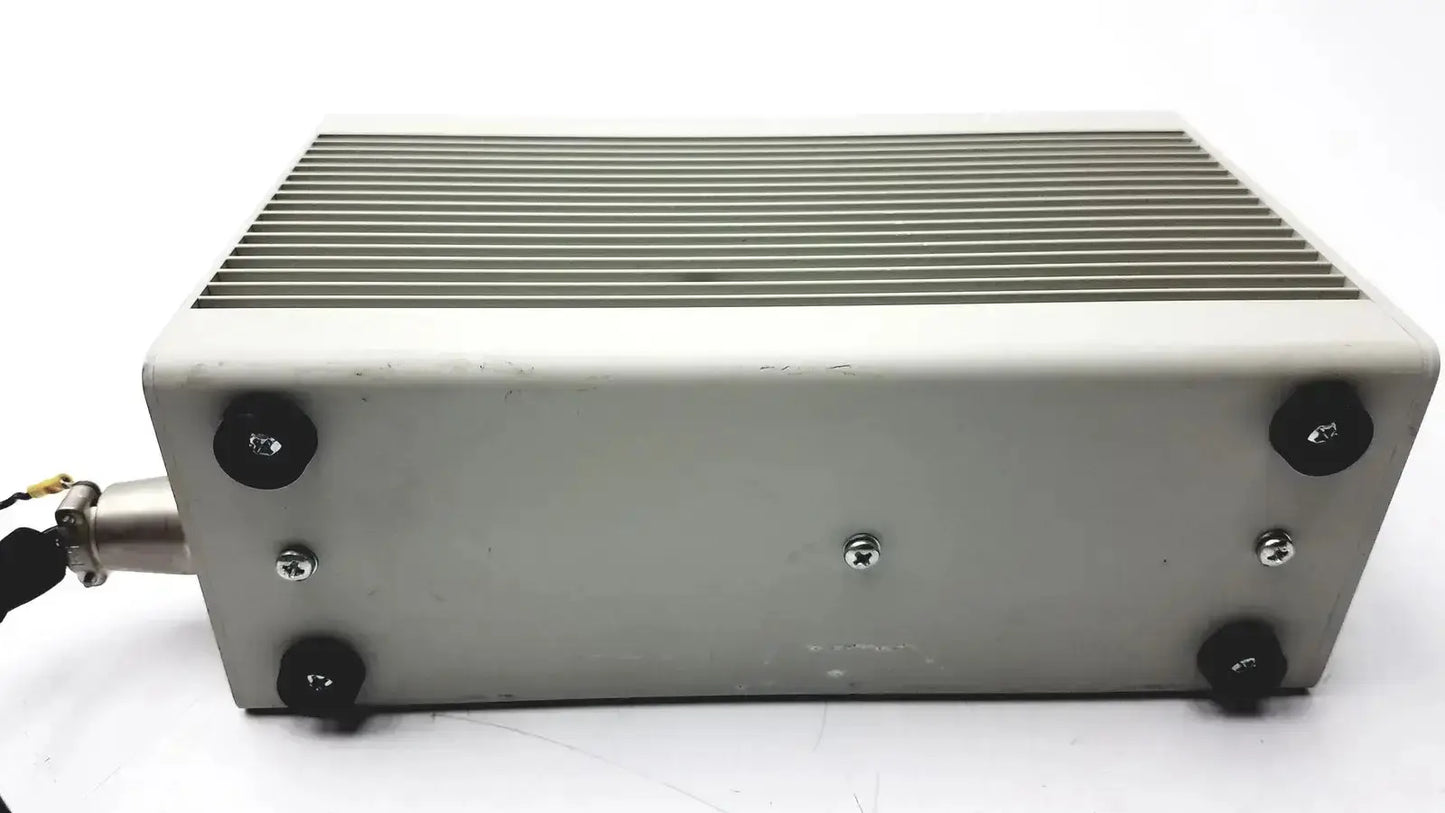 Silver metallic olympus th4-100 100w-120v halogen power supply with ribbed heat sink and black rubber feet