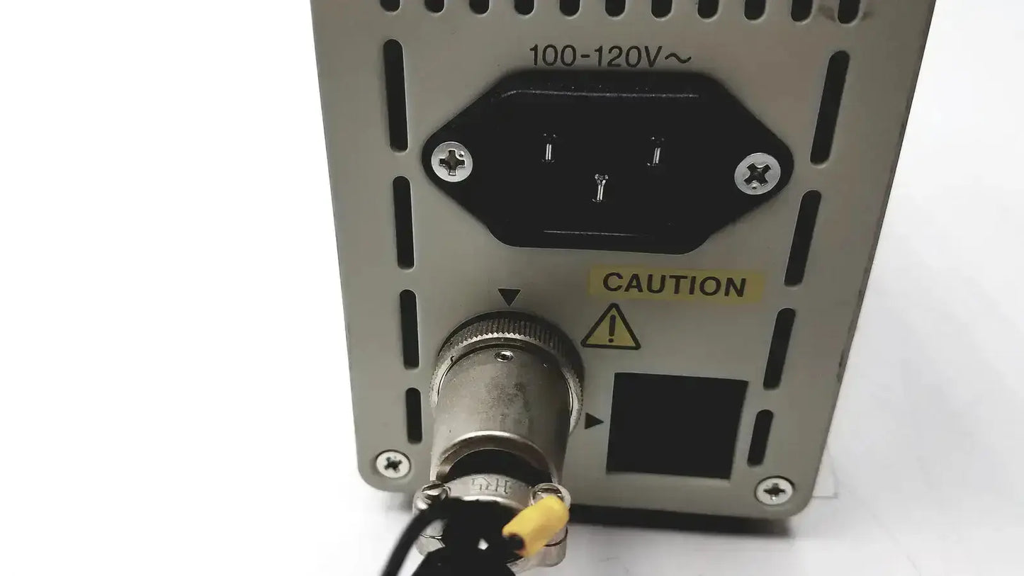 Silver metallic olympus th4-100 100w 120v halogen power supply with black ac input plug and threaded output connector