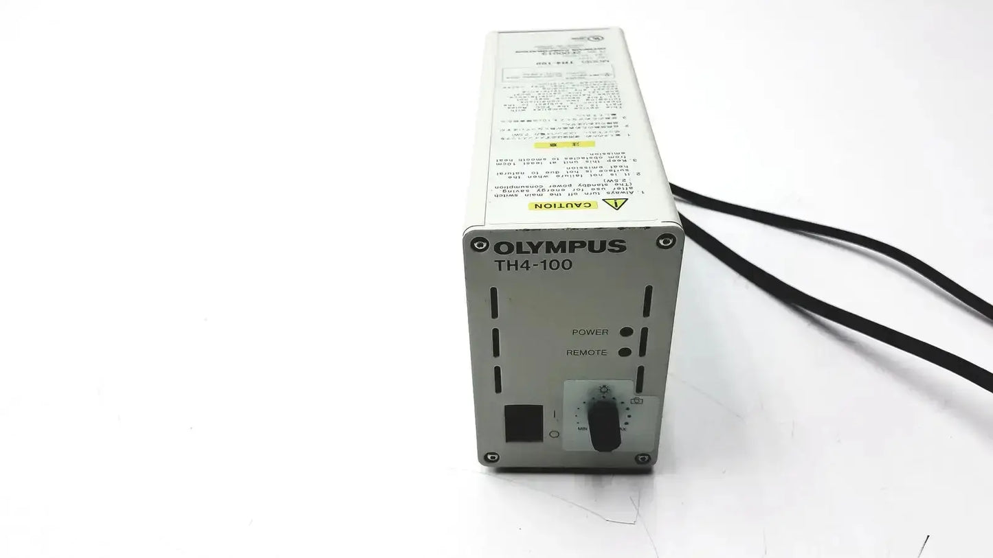 Silver olympus th4-100 halogen power supply unit with black cables and rotary switch for reliable halogen power control