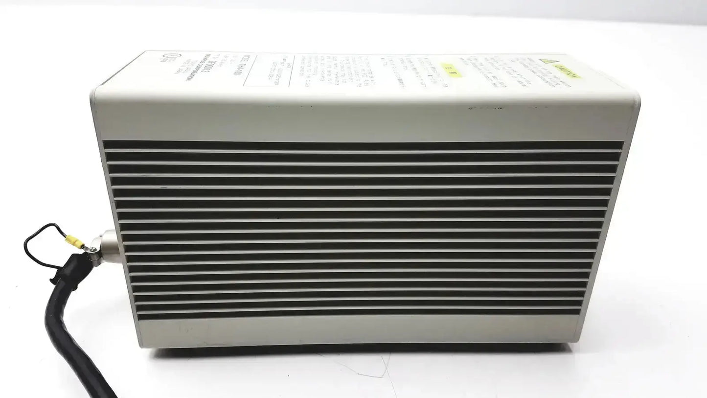 Gray rectangular Olympus TH4-100 100W-120V halogen power supply with horizontal ventilation slats and black cable side extension