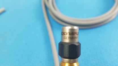 Olympus wa03300a light guide featuring a metallic sensor head with black hexagonal collar and gold base for medical equipment
