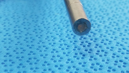 A metallic cylindrical pen tip with dark blue grip and silver band in olympus wa03300a light guide medical equipment