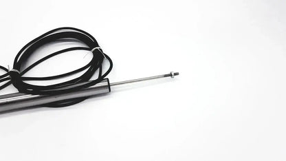Black coiled cable wrapped around omega ld300-150 lvdt linear position sensor with metallic cylindrical body and threaded rod end