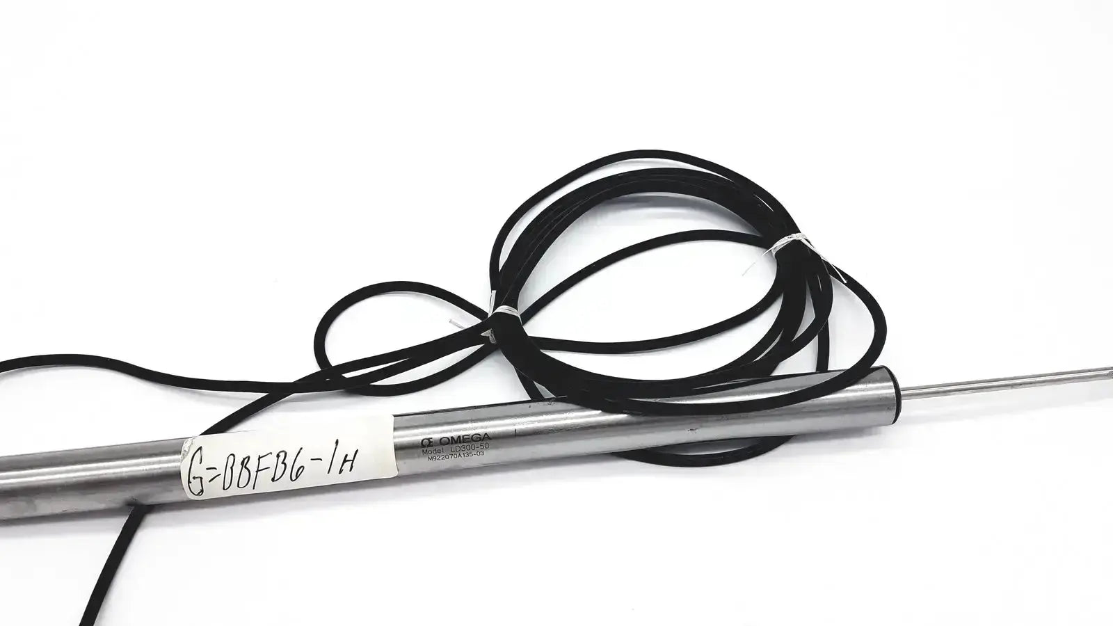Silver cylindrical omega ld300-150 lvdt linear position sensor with black coiled cable and printed label linear position sensors