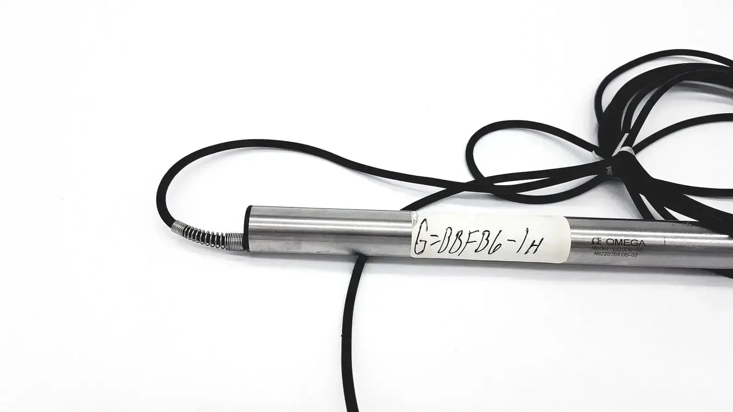 Silver cylindrical omega ld300-150 lvdt linear position sensor with black coiled cable and white brand label