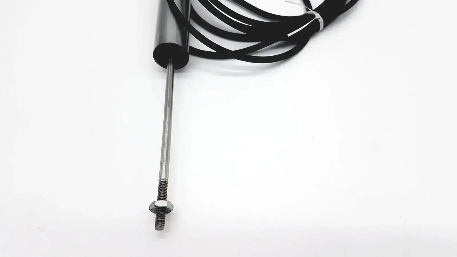 Black coiled cable attached to metallic sensor probe with threaded end and hexagonal nut for omega ld300-150 lvdt linear position sensor