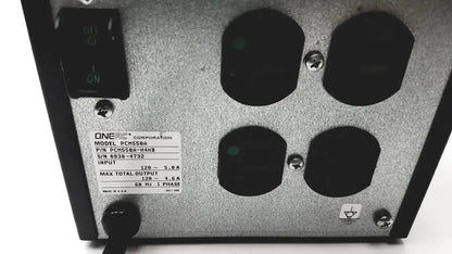 Silver metallic conditioned power pcm550a unit with black input ports and green-lit switch labeled oneac corporation model pcms58a