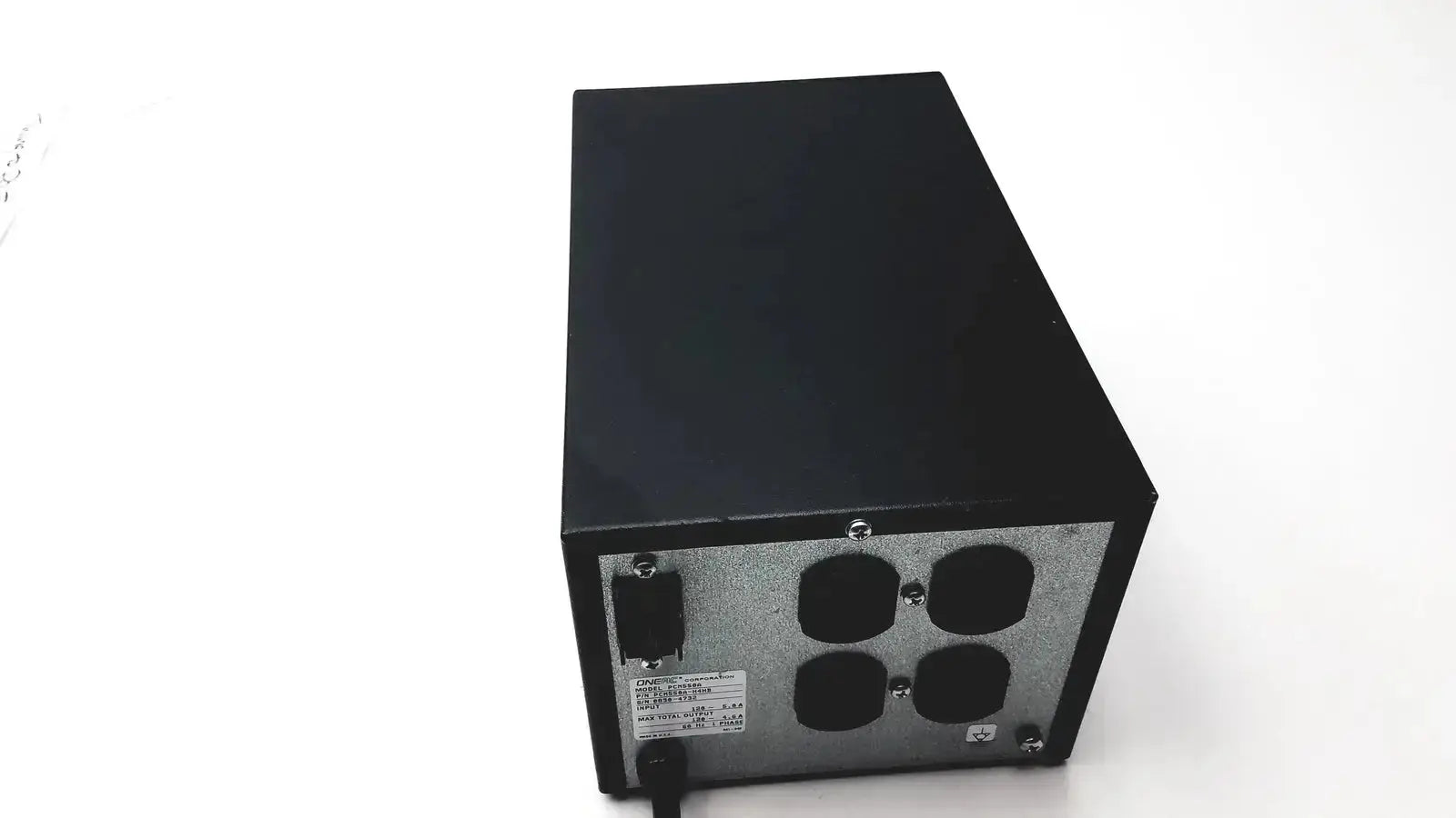 Black rectangular power supply unit back panel with ventilation holes and label for oneac conditioned power pcm550a