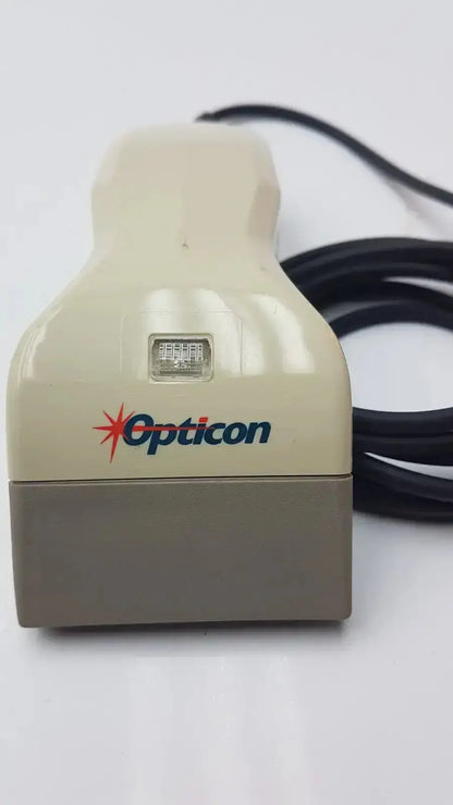 Cream-colored and gray opticon barcode scanner opt-1125 with black cable for pre owned medical equipment use