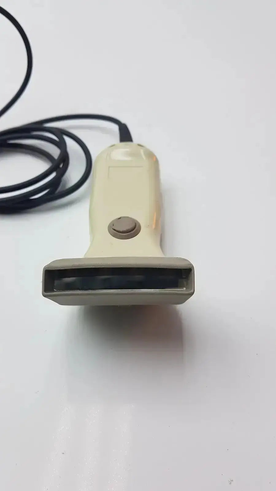 Cream-colored opticon barcode scanner opt-1125 with black cable and gray scanning head for buy used medical equipment