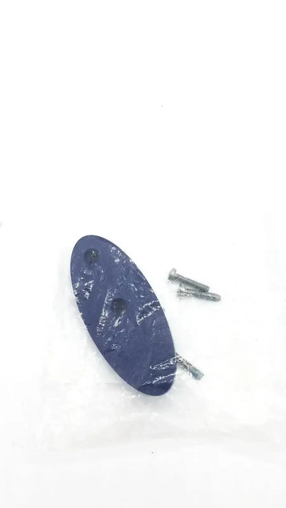 Dark blue oval magnetic base made of plastic with three pre-drilled holes for secure screw mounting